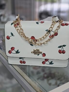 Coach White Leather Crossbody with Red Cherry Print & Gold Chain Detail